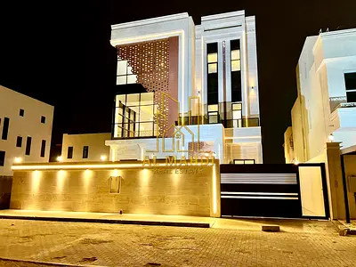 The epitome of luxury and privacy in Al-Aliya: a modern two-story villa with a rooftop terrace and private pool, all at a price including registration