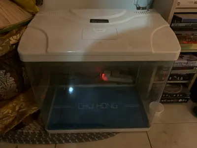 Medium plastic fish aquarium with hood