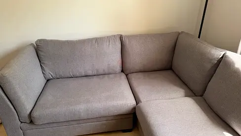 L-shaped grey sofa