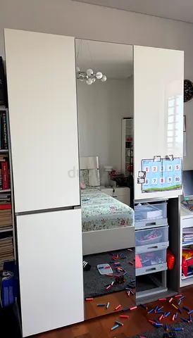 Modern queen sized bed with matching side drawers and Wardrobe with Mirrored Center Door