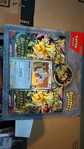 Pokémon TCG Ascended Heroes blister pack with promo card and coin