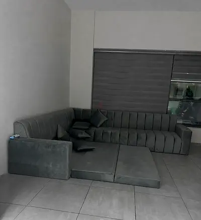 L-shaped velvet sectional sofa with pull-out mattresses (Grayish green)