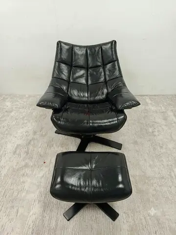 Real leather Natuzzi Italia rocking seat with ottoman