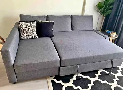 Grey L-shaped Sofa Bed with Storage - Good Condition