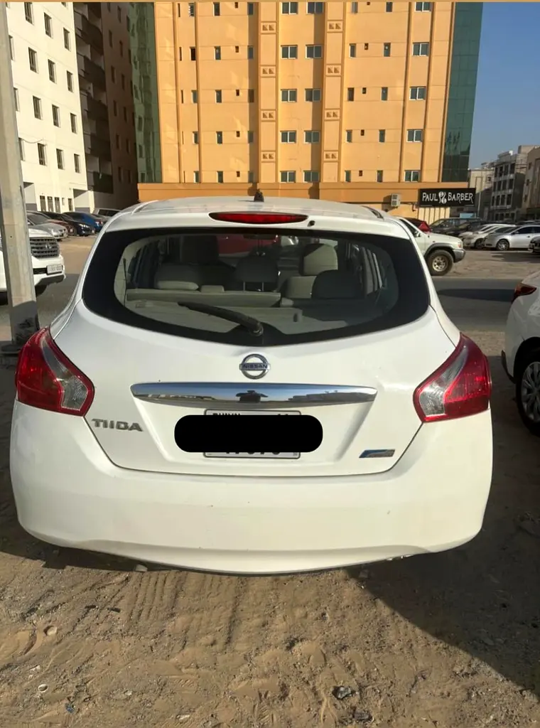 Nissan Tiida 2014 — photo 1 of 6