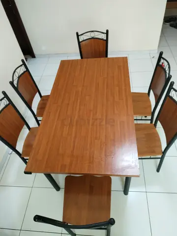 Wood-effect dining table with 6 chairs - good condition