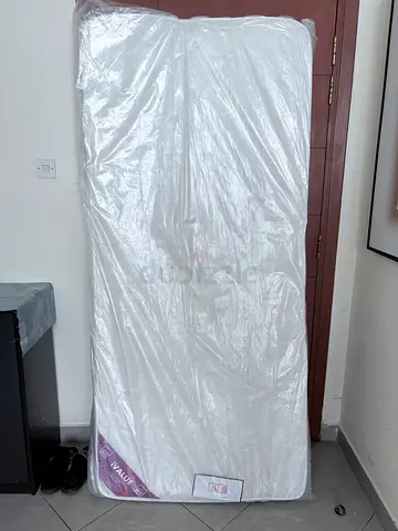 Single mattress in plastic wrap - New