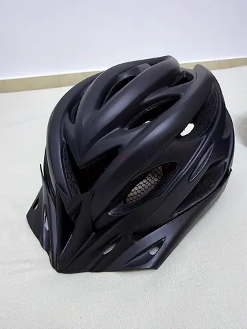 SALE! All 3 for 120aed! Used matte black cycling helmet — good condition