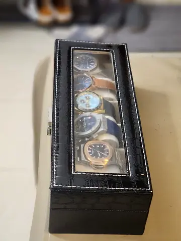Wristwatches in Black Display Case