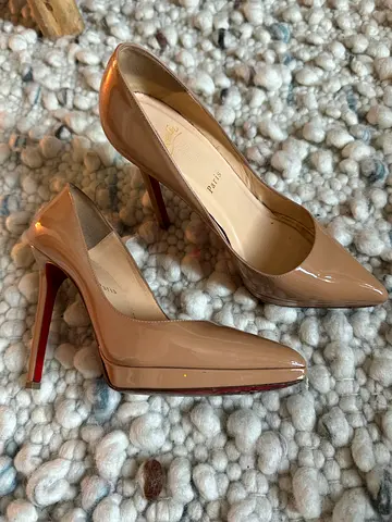 Christian Louboutin nude pumps