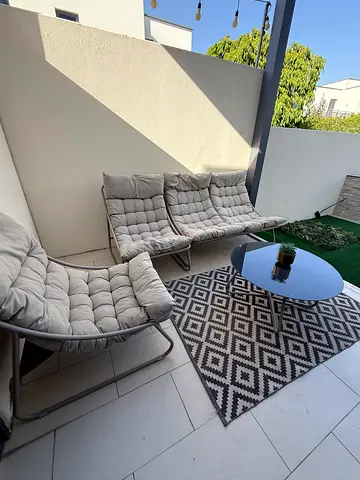 Outdoor 3-piece cushioned patio seating set with side table