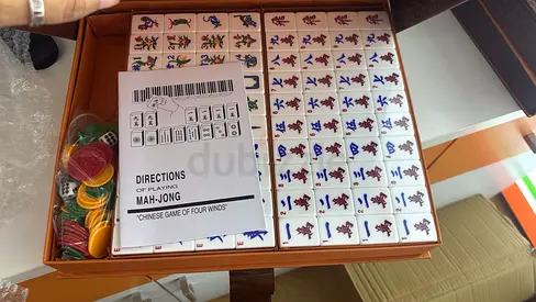 Complete Mahjong Set with Tiles, Chips and Rules -totally new and in original packing yet!