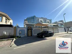 Spacious villa in Al Rifa’a featuring 5 bedrooms, 5 bathrooms, 4 balconies, a master maid’s room