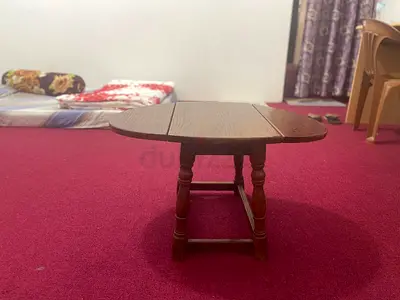 Wooden Oval Coffee Table with Drop Leaves