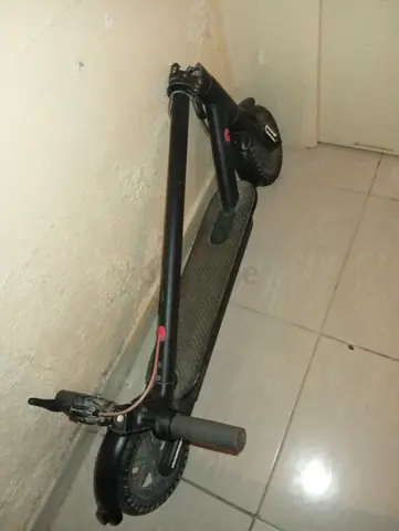 Used foldable electric scooter — single motor, good condition