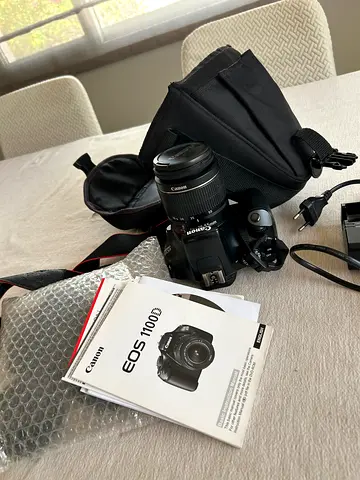 Canon EOS 1100D DSLR with 18-55mm Lens, Bag and Manuals