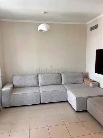 Light beige modular sectional sofa - good condition