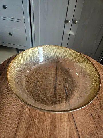 Glass decorative bowl with textured gold rim