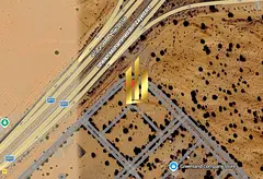 A prime commercial plot of land for sale in a specific location on Sheikh Zayed Road, E611 area, ove