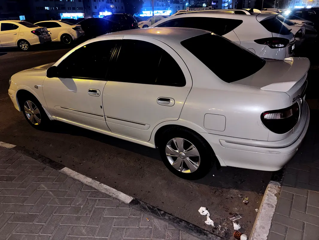 Nissan Sunny 2003 — photo 1 of 10