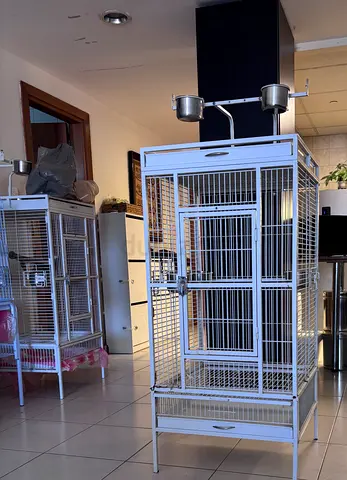 Large white metal bird cage with stand, feeders and drawer