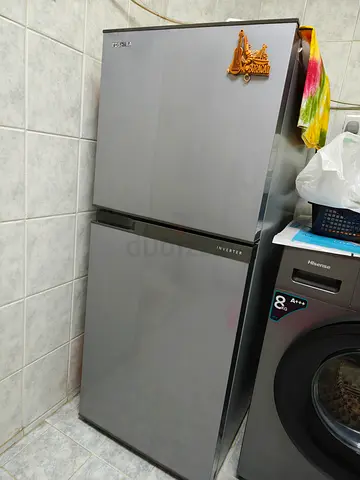 Two-door compact refrigerator in good condition