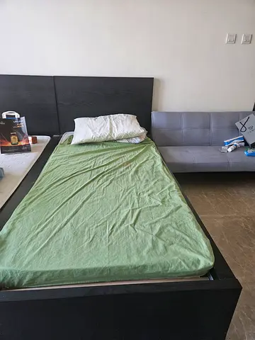 IKEA bed frame with headboard - dark wood
