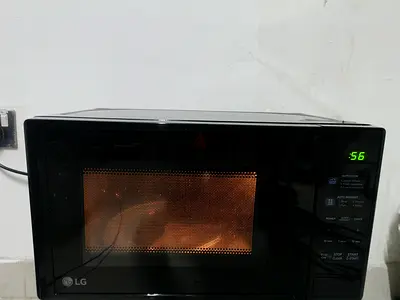 LG Black Microwave Oven with Auto Cook and Defrost