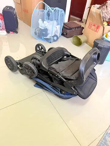 Lightly used double stroller with cup holder and canopy