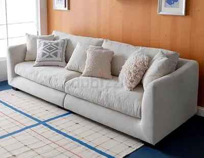 Comfortable Light Beige Three Seater Sofa with Cushions