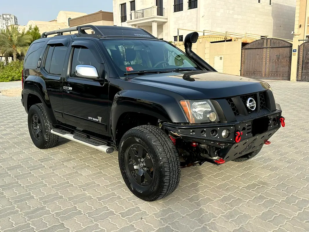 Nissan Xterra 2013 — photo 1 of 18