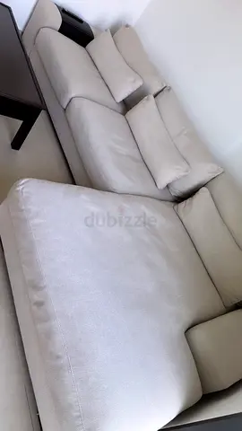 Light beige L-shaped fabric sofa - good condition