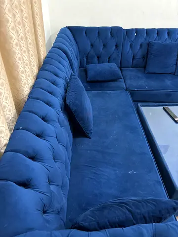 Blue Chesterfield Style L-Shaped Sectional Sofa with Matching Ottoman
