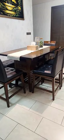 Solid wood Dining table with rotating chairs