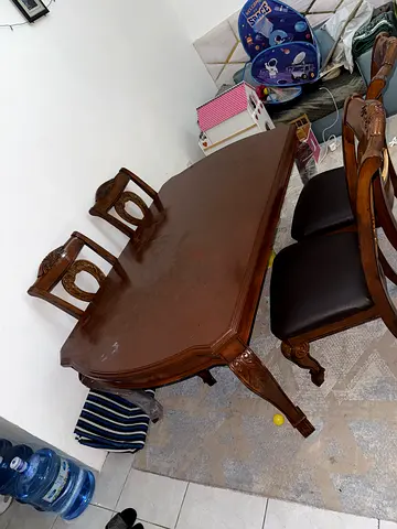 Solid wood dining table with 6 chairs. Good condition. Pickup from Al Majaz/Sharjah. Price negotiabl