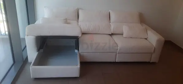 Ikea beige color Eskilstuna sofabed with storage space