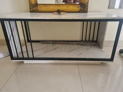 Modern marble-look TV/entertainment console with metal frame