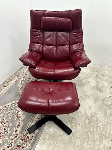 Looks great condition Natuzzi arm chair with footstool