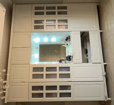 Large White Wooden Wardrobe with Built-in Vanity and Mirror