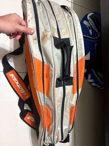 Genuine Babolat tennis bag. Multiple compartments for rackets and accessories. All zippers working.