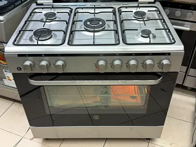 Hoover  gas cooking range 90by60cm 5 burnal  perfect working and good condition
