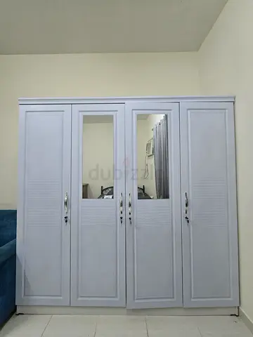 White 4-Door Wardrobe with Mirror - Good Condition