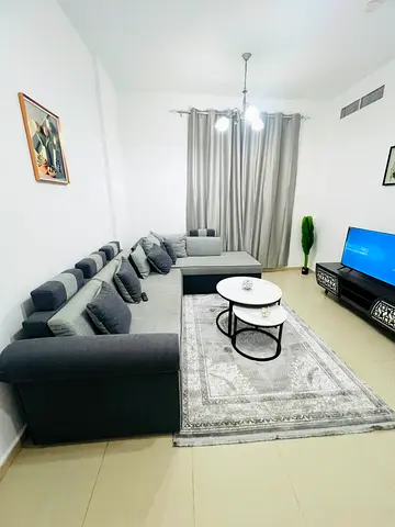 Furnished one-bedroom apartment for monthly rent | Prime location in Al Khan, Sharjah, on the Dubai exit | Ready for immediate occupancy | Rent includ