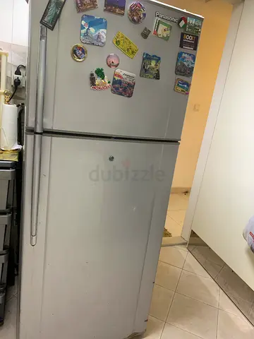 Used double-door refrigerator, good working condition