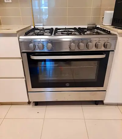 Hoover 5 burner top gas with electric oven size 90cm