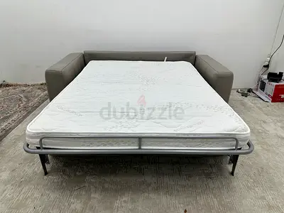 Looks brand new Natuzzi brand sofabed