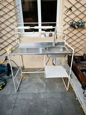 IKEA Used stainless steel outdoor sink with faucet and shelf