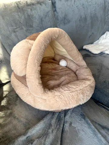 Soft beige plush donut pet bed - gently used