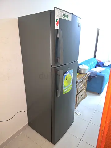 Used double-door refrigerator in good working condition