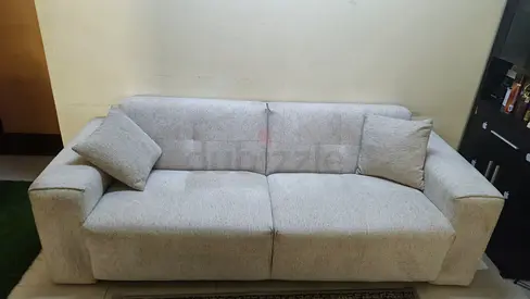 Light grey 3-seater fabric sofa in good condition